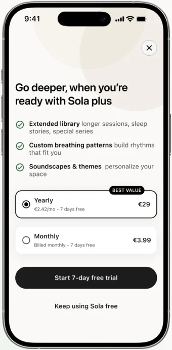 The Sola plus screen: what premium adds, the two plans, and a Keep using Sola free link.